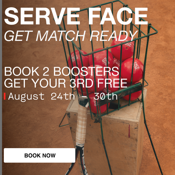 a tennis racket and balls in a basket