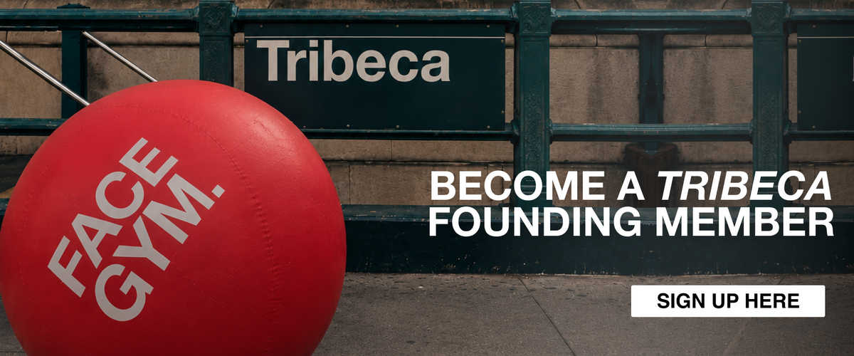 a red ball next to a sign