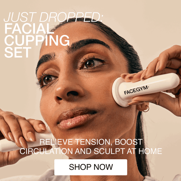 a woman using a face massager